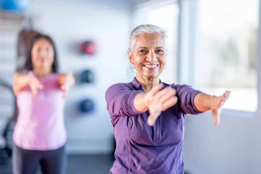 A group of seniors in a balance class for elderly that helps improve strength and stability for residents at Westminster Village at West Lafayette.