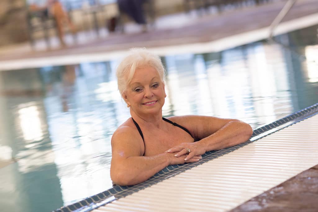 senior woman at pool at the Live Well Fitness and Rehab at Westminster Village West Lafayette