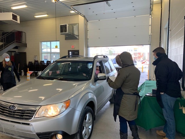 Westminster Village Meals on Wheels Event Car picking up meal