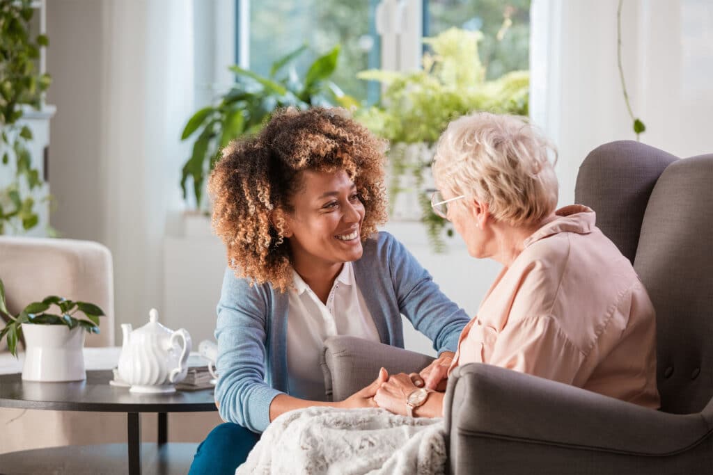 caregiver and elderly woman