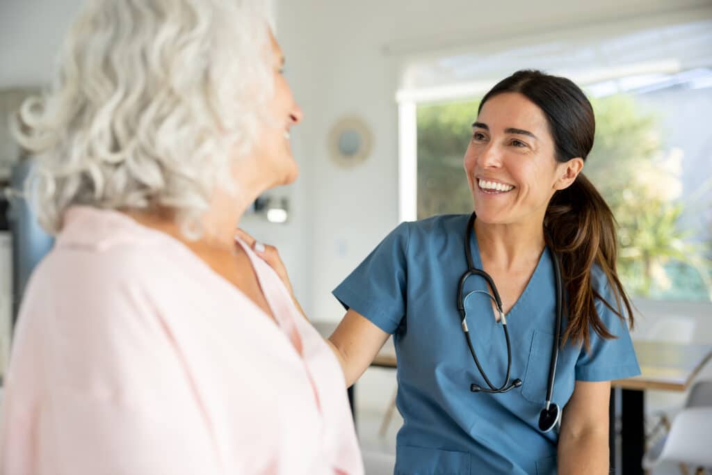 senior woman with a nurse