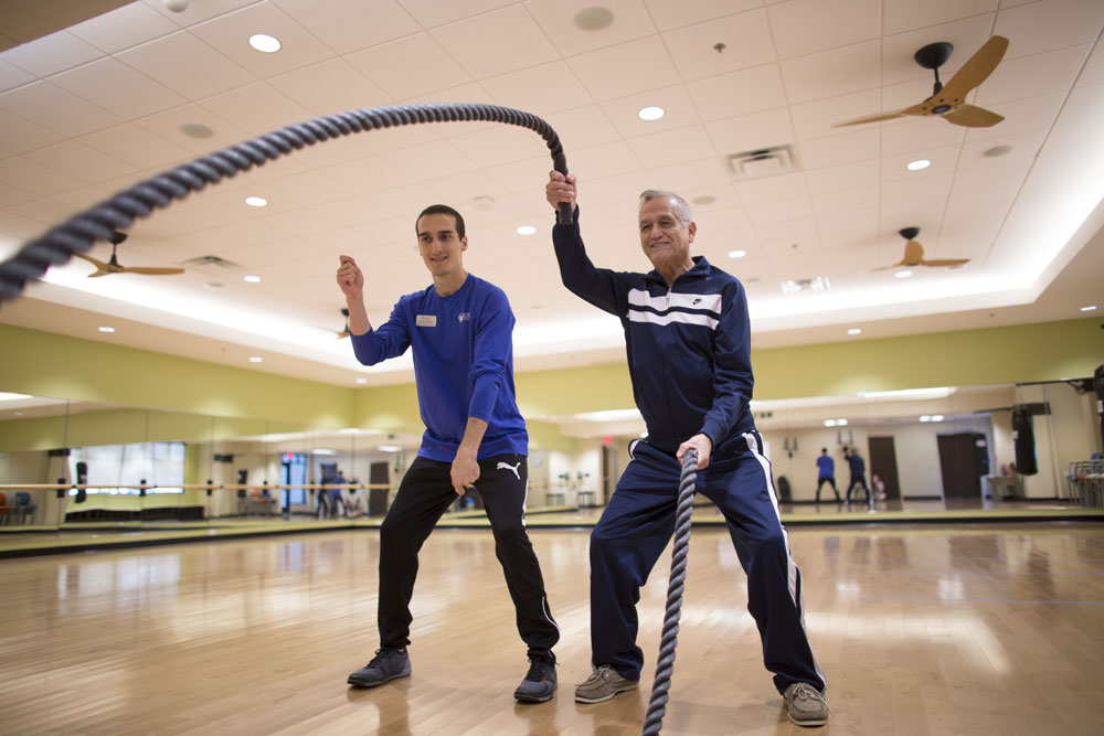 Senior Doing Rope Pulling Exercise At Westminster Village