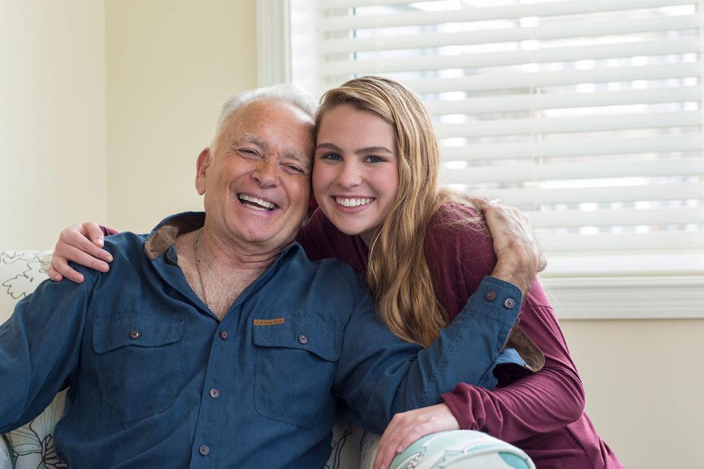 Senior living resident smiling and hugging family member near Wabash Township