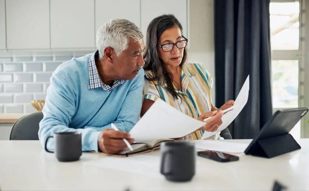 A senior couple looking at the the differences between different senior living models like rental communities and buy-in life plan communities in West Lafayette, IN.